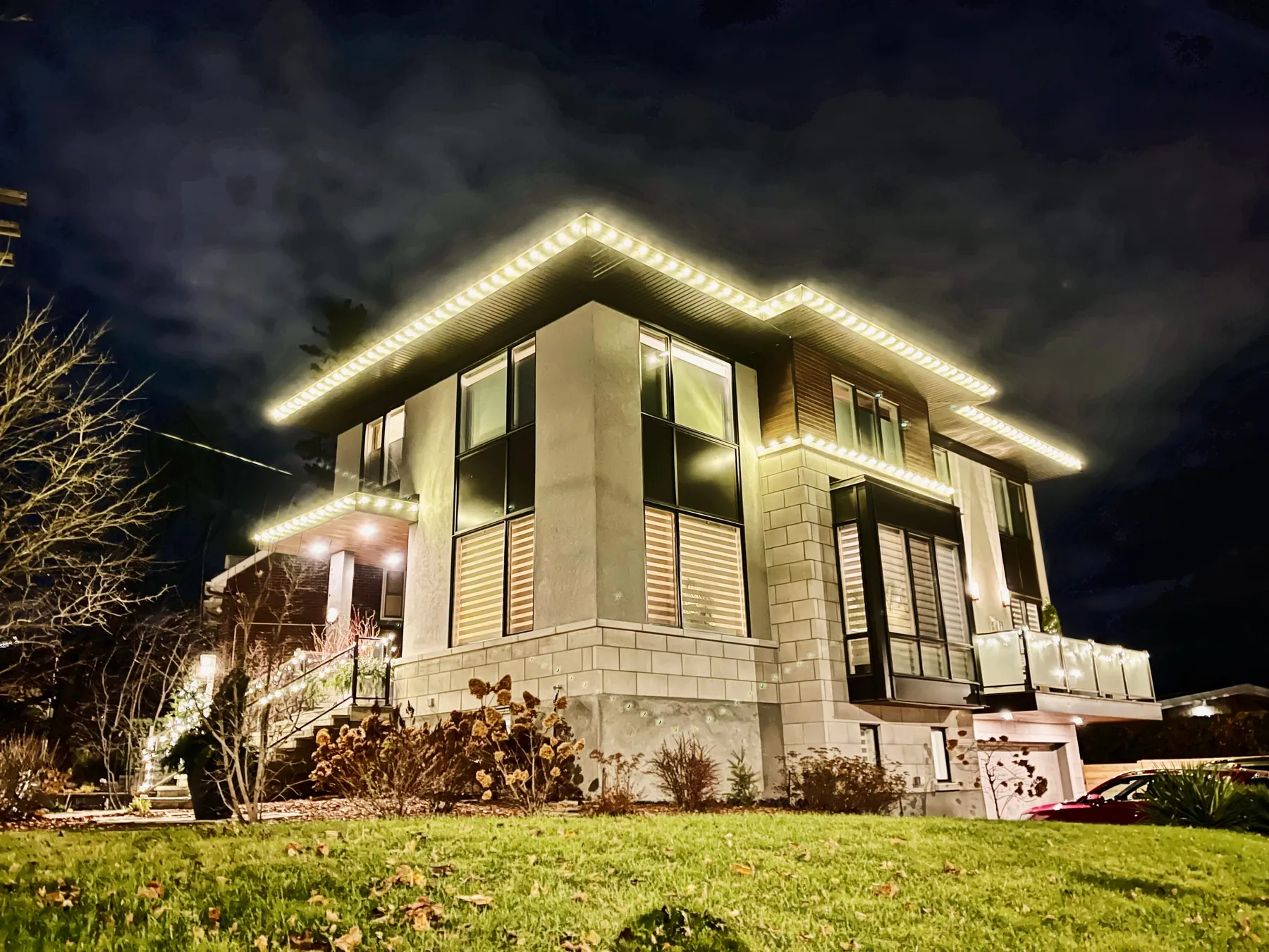 Home with a lit roofline